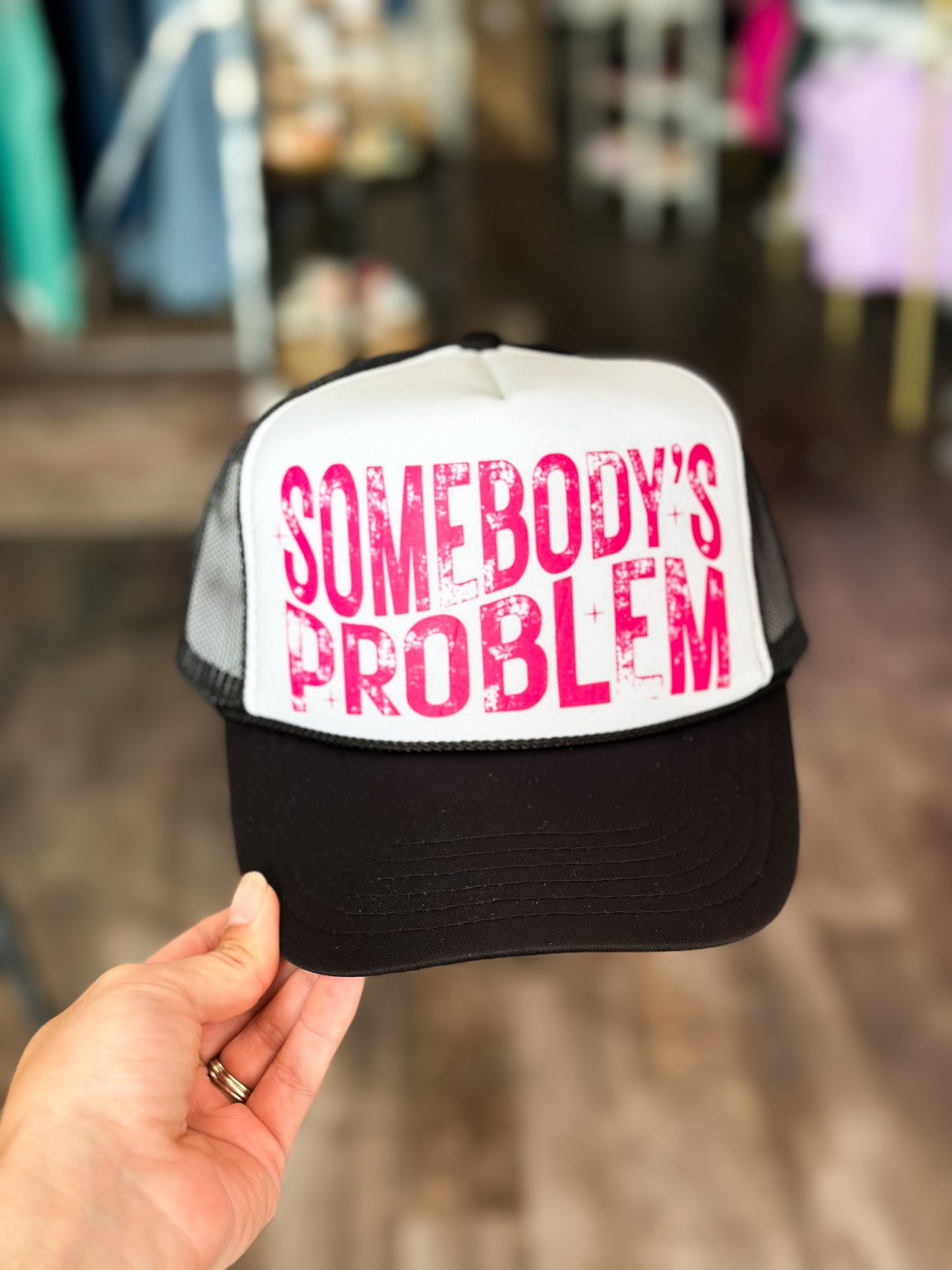 Somebody’s Problem Trucker Hat