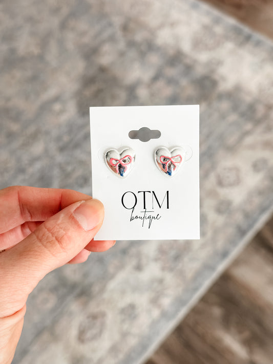 Metallic Pink Bow Studs